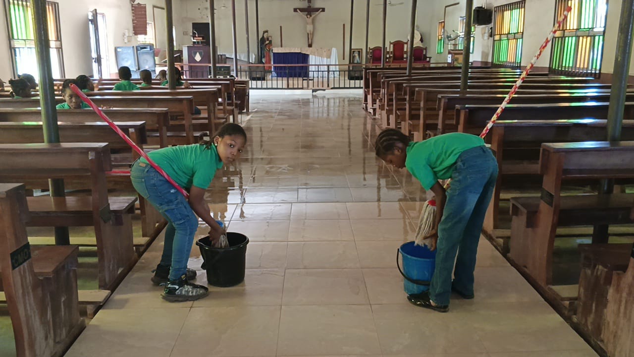 student cleaning