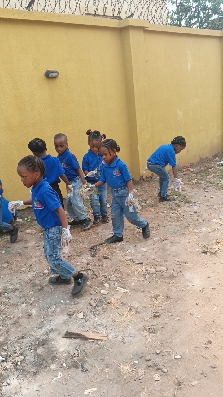 group of students cleaning
